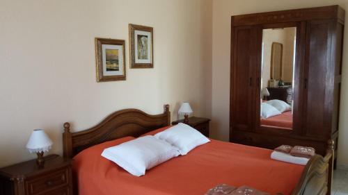 A bed or beds in a room at Agriturismo Podere La Cascata
