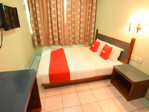 Кровать или кровати в номере OYO 89642 Highway Inn