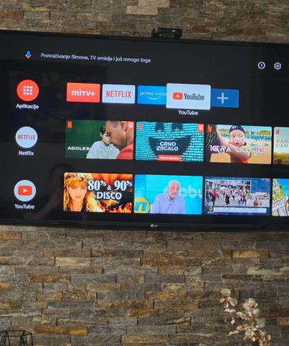 a television screen with a bunch of different websites at Sunset in Zlatibor