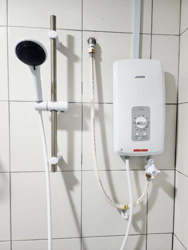 a white box on a wall in a bathroom at Malacca 3 bedroom Seri Serindit 07 in Malacca