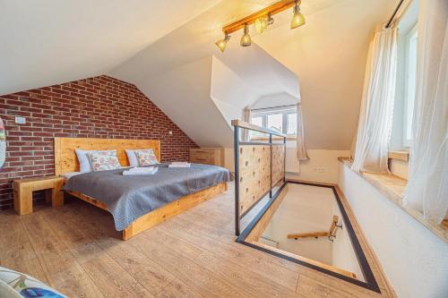 Postel nebo postele na pokoji v ubytování Apartmány Lenkoska