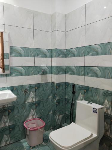Un baño de Anantha Guest House