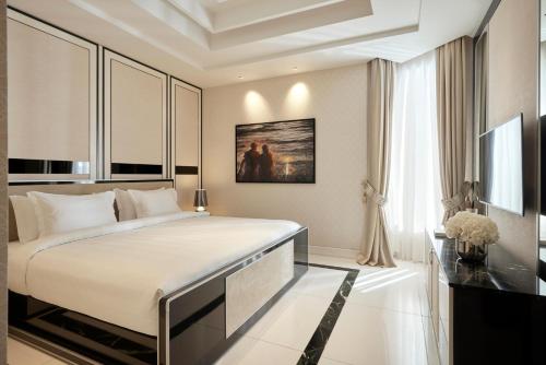 Pomegranate Wellness Spa Hotelにあるベッド