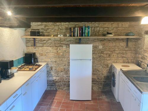 Kuchyň nebo kuchyňský kout v ubytování The Cowshed