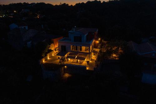 an aerial view of a house at night with lights at Casa Di Sebastian in Gaios