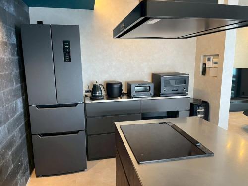 Dapur atau dapur kecil di AWAJI OCEAN BASE east coast