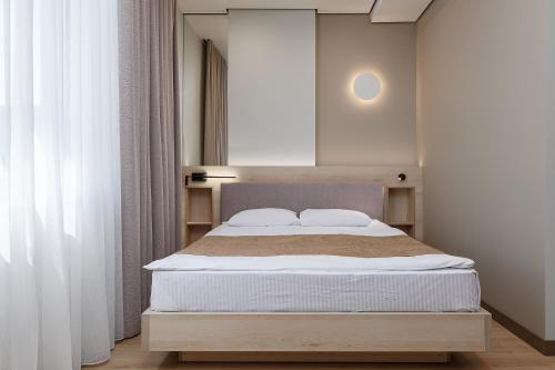 Postel nebo postele na pokoji v ubytování Jam Apartments Shevchenka