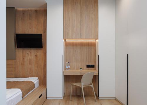 TV a/nebo společenská místnost v ubytování Jam Apartments Shevchenka