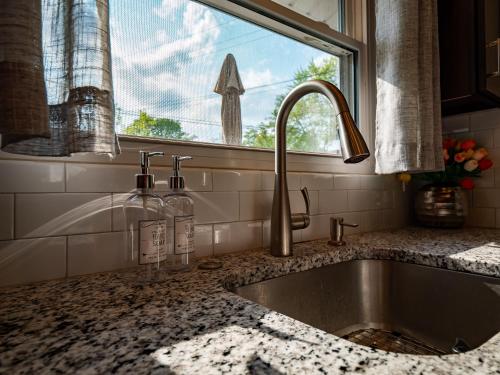 a kitchen with a sink and a window at Beachwood Ave, Avon Lake in Avon Lake