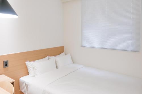 Hotel Carpetにあるベッド