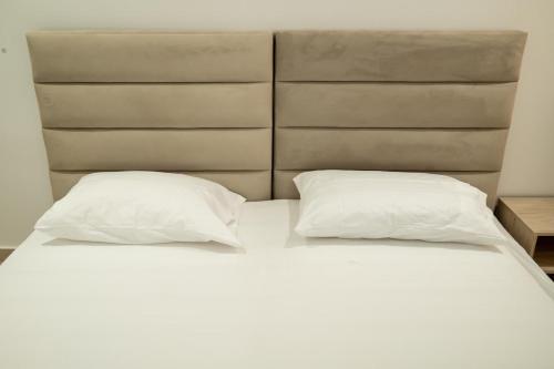 Krevet ili kreveti u jedinici u objektu AEDNA Apartment