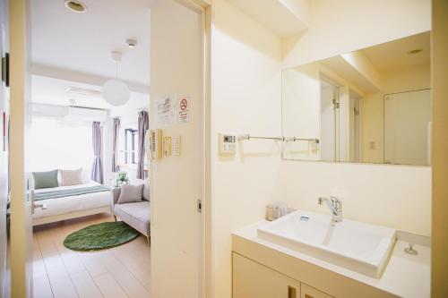 Koupelna v ubytování R Residence 谷町