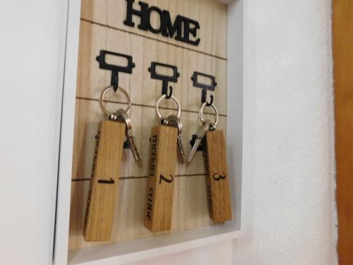 a picture of a group of keys on a wall at Mendel Stube in Cavareno