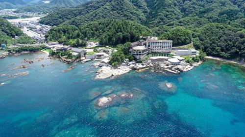 an aerial view of a resort on the beach at Hotel Kinparo in Toyooka