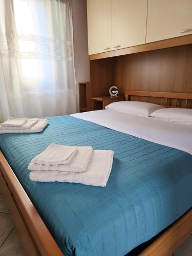 Letto o letti in una camera di La Casa di Giorgia