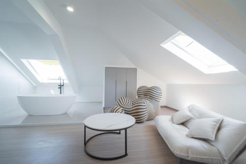 a living room with a couch and a table at Daishan Mountain and Sea Cloud Homestay Sunrise Seaview Bed and Breakfast in Zhoushan