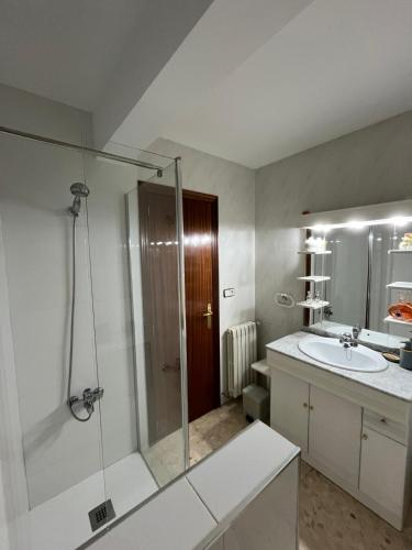 a bathroom with a shower and a sink at Castelserás apartamento rural in Castelserás