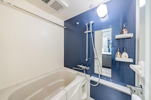 Ένα μπάνιο στο Apartment Hotel 11 Abeno