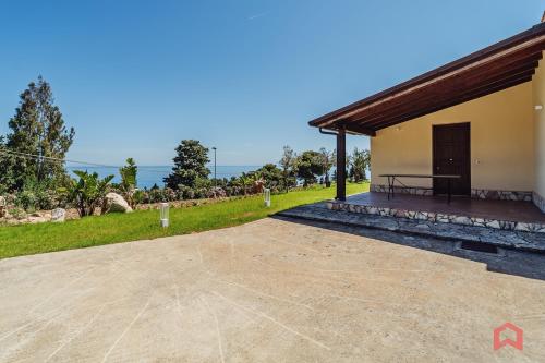 an image of a house with a patio at Cute Holiday Home & Pool by Scopello Sea in Scopello
