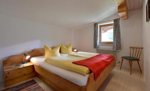 Ένα ή περισσότερα κρεβάτια σε δωμάτιο στο BED and BREAKFAST Pension Foidl