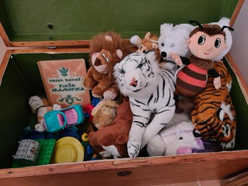 a bunch of stuffed animals in a drawer at Slunečnice - Ubytování v soukromí na Třeboňsku in Třeboň