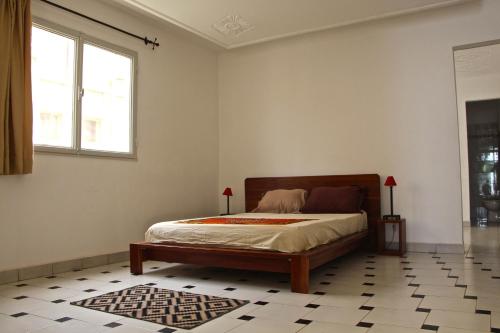 Posteľ alebo postele v izbe v ubytovaní B & B Le Nomade