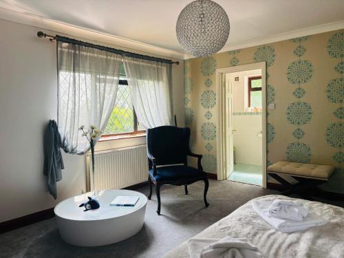 Postel nebo postele na pokoji v ubytování Maison spacieuse pour famille près de Brighton avec jardin