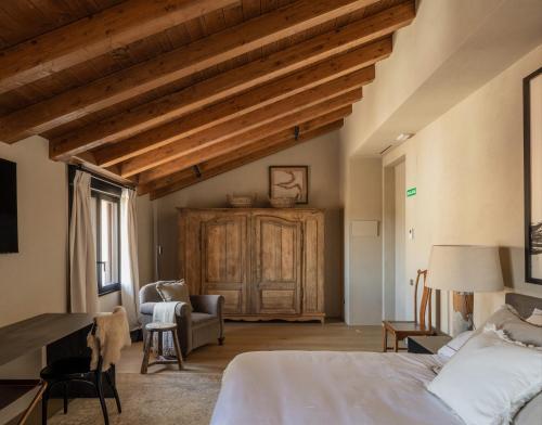 Ένα ή περισσότερα κρεβάτια σε δωμάτιο στο Hotel Boutique Mirador de Deyo