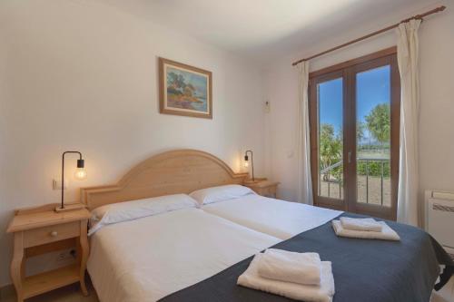 Postel nebo postele na pokoji v ubytování Ca Na Volantina