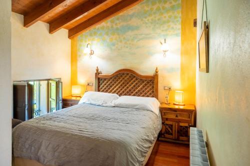 Ένα ή περισσότερα κρεβάτια σε δωμάτιο στο Hotel Rural Sucuevas