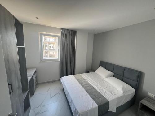 Suli Beach Apartmentsにあるベッド