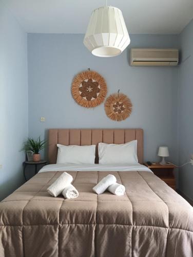 Ένα ή περισσότερα κρεβάτια σε δωμάτιο στο Vassia's B rooms