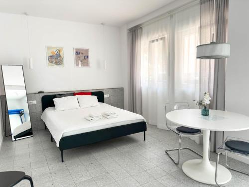 Postel nebo postele na pokoji v ubytování Apartamentos Navío