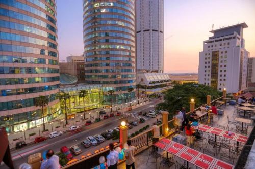 a view of a city with traffic and buildings at Oak Ray Colombo City Hotel in Colombo
