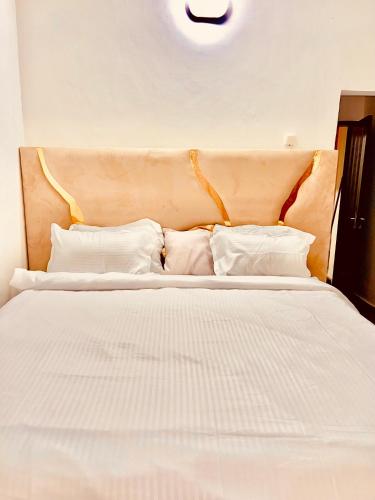 Ένα ή περισσότερα κρεβάτια σε δωμάτιο στο KDK Home appart