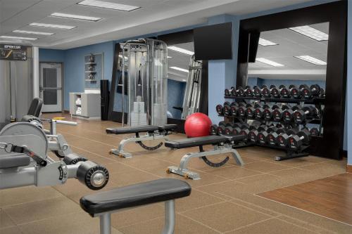 a gym with a lot of exercise equipment at Homewood Suites by Hilton Seattle/Lynnwood in Lynnwood