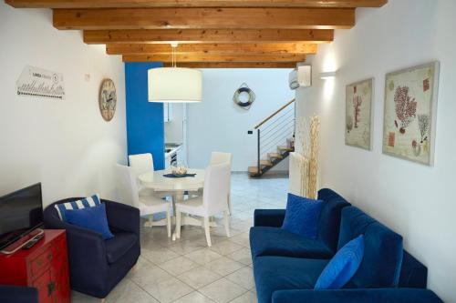 Predel za sedenje v nastanitvi Stella Marina 1