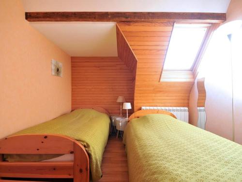 Ένα ή περισσότερα κρεβάτια σε δωμάτιο στο Charmant gîte à Riquewihr avec jardin et parking privé - FR-1-744-45