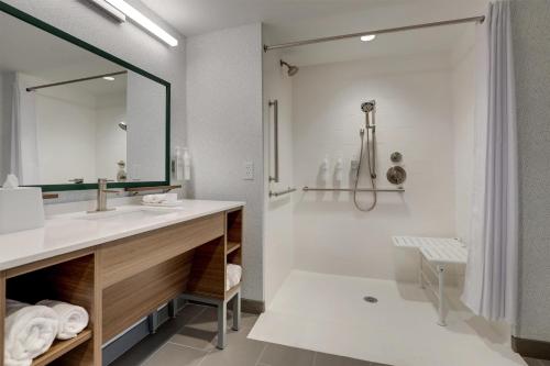a bathroom with a sink and a shower at Home2 Suites By Hilton Conway, Sc in Conway
