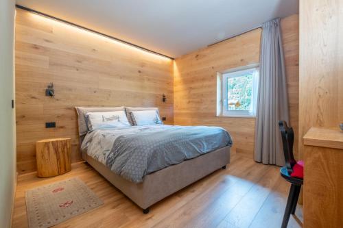 Postel nebo postele na pokoji v ubytování Comfort Apartment Dimaro by Varental