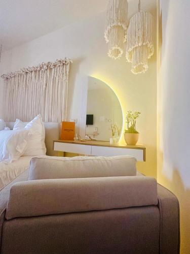 a bedroom with a bed and a large mirror at La Presentosa b&b in Fossacesia