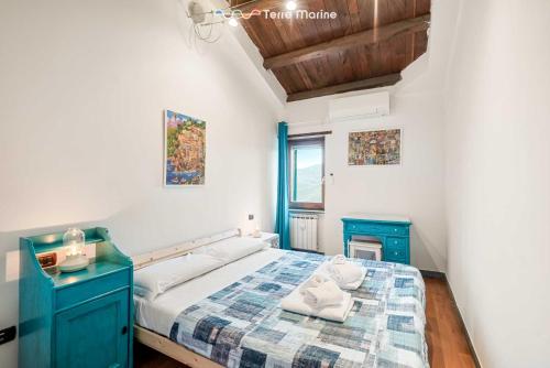 Una cama o camas en una habitación de Laya Marina, Terre Marine