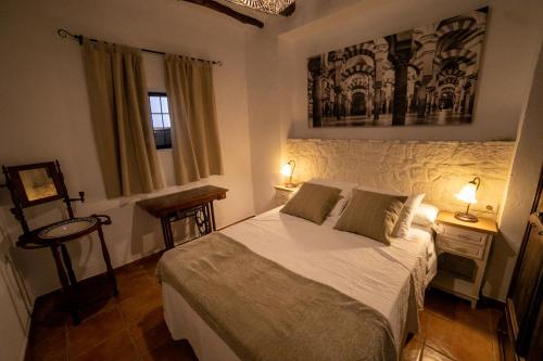 En eller flere senge i et værelse på Villasecre Casa Rural