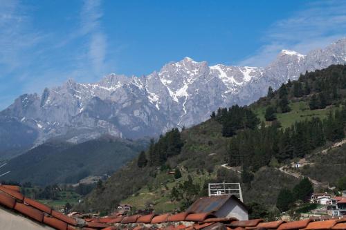 a view of a mountain range with snow covered mountains at Miravilla 25 Potes 1 in Potes