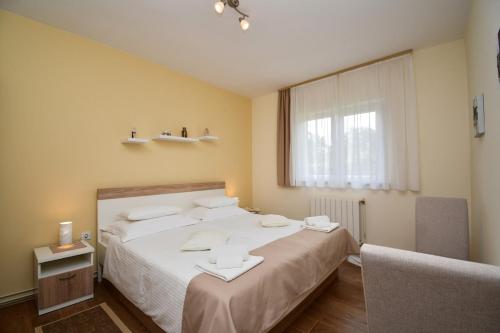 Posteľ alebo postele v izbe v ubytovaní Apartment Brijuni