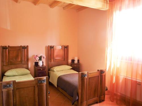 La Cascina del Soleにあるベッド