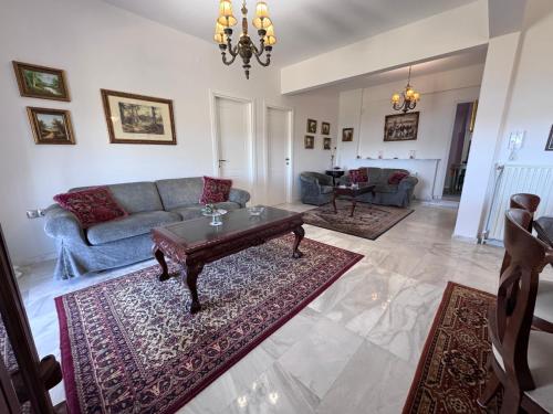 Χώρος καθιστικού στο Kyriakos Villa Suite