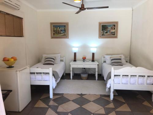 Katil atau katil-katil dalam bilik di Golf View Guest House