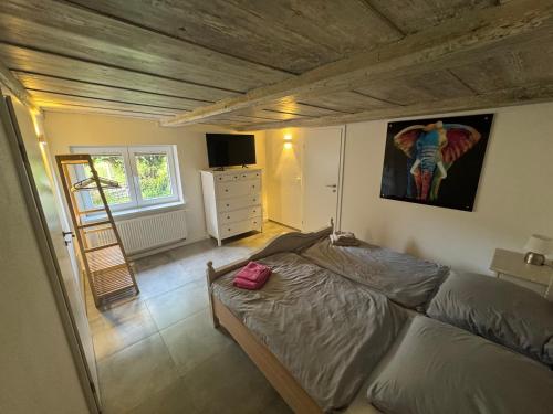 Katil atau katil-katil dalam bilik di Ferienhaus Elbsicht