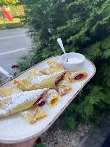 a plate of food with a plate of food at Biruza Club in Svyatopetrivske